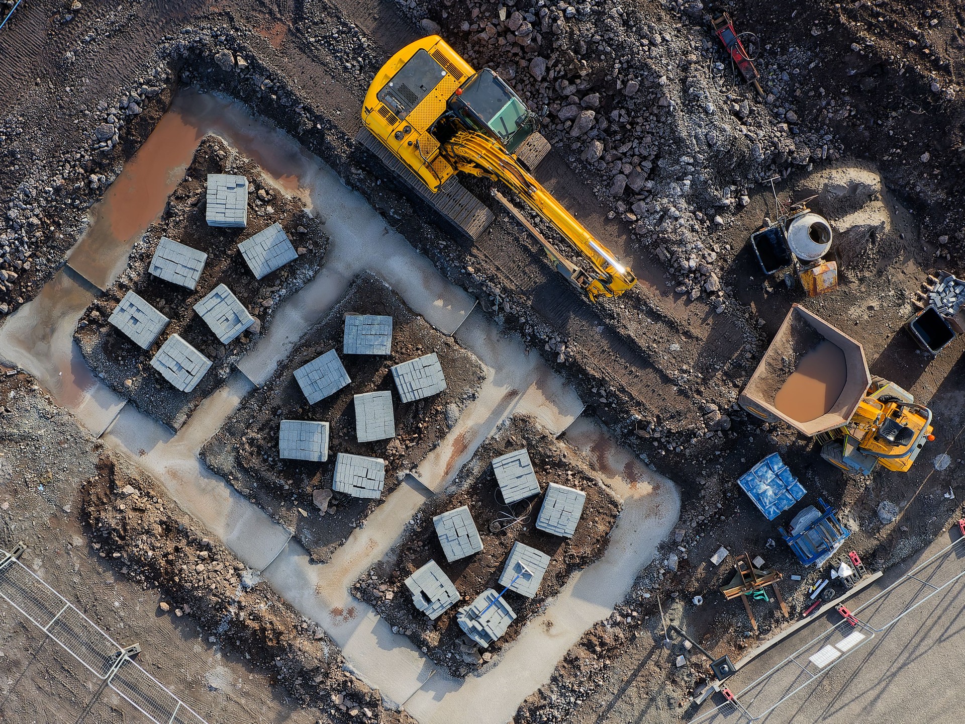 Construction building site aerial view showing materials